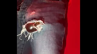 Amateur boy pissing in a condom